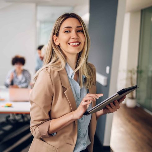 Smiling Confident Business Leader Looking Camera